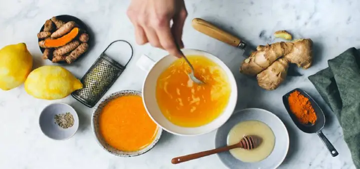 Bí Quyết Ngâm Rượu Gừng Nghệ Cho Bà Đẻ: Công Thức Chuẩn, Tác Dụng Làm Đẹp & Phục Hồi Sau Sinh