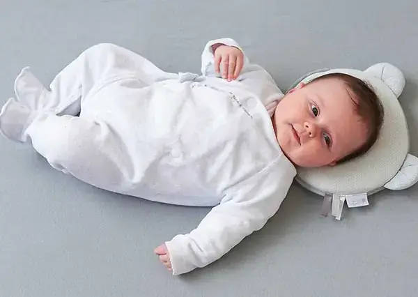 Trẻ Sơ Sinh Có Nên Nằm Gối Không? Hướng Dẫn Chi Tiết Từ Chuyên Gia